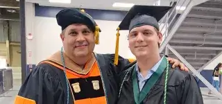 Dr. Ed Santiago and Levi Leuck at graduation